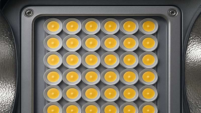Technology Behind Bright Stadium Lights Close-up of a powerful LED chip array in a stadium floodlight