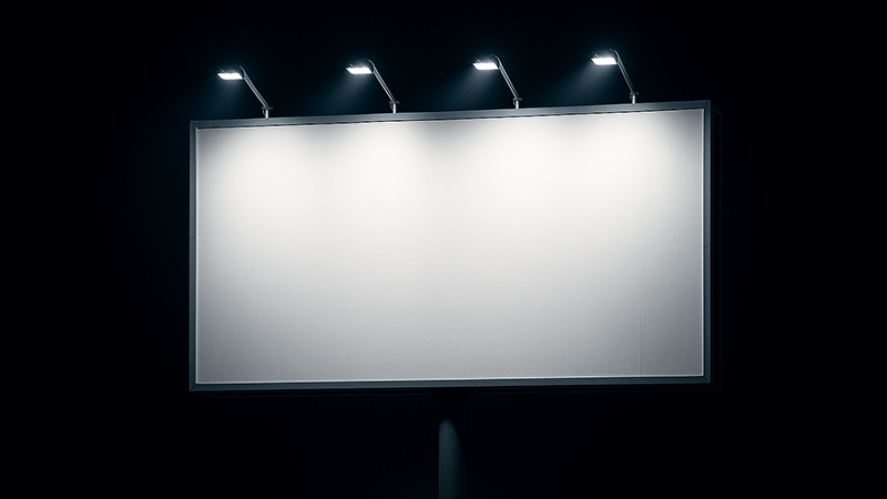 LED Floodlights for Outdoor Advertising A brightly lit billboard at night using LED floodlights