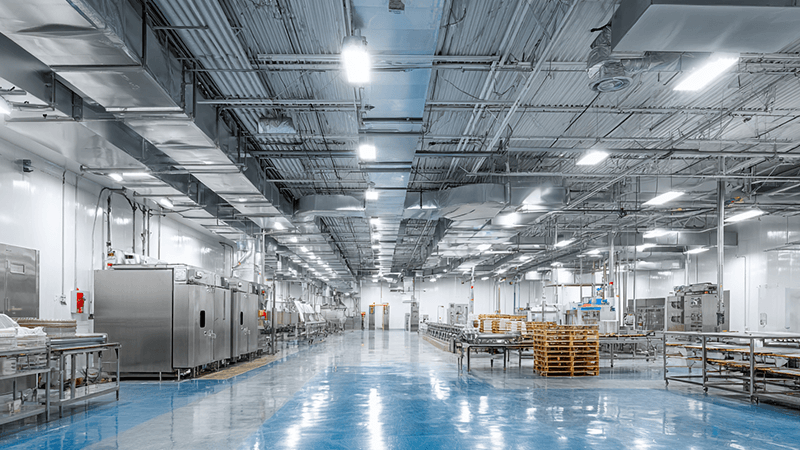 A clean food processing facility with sealed and shatterproof lighting fixtures