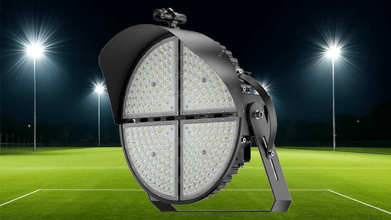 A brightly lit sports field at night with high-mast LED floodlights