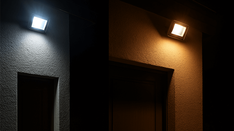 A comparison of a harsh, cool white LED floodlight versus a warmer, softer one.