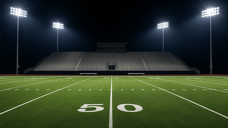 LED stadium lights illuminating a football field
