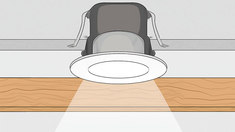 A cross-section view showing a recessed light fixture and a ceiling joist.