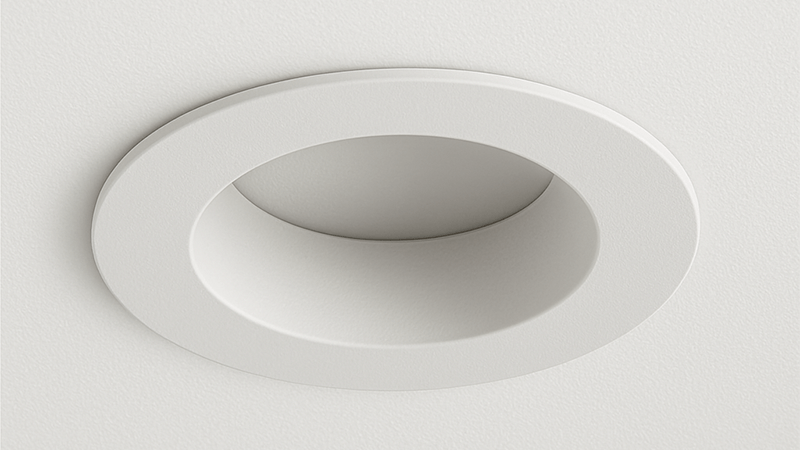 A sleek, modern fixed downlight installed in a ceiling