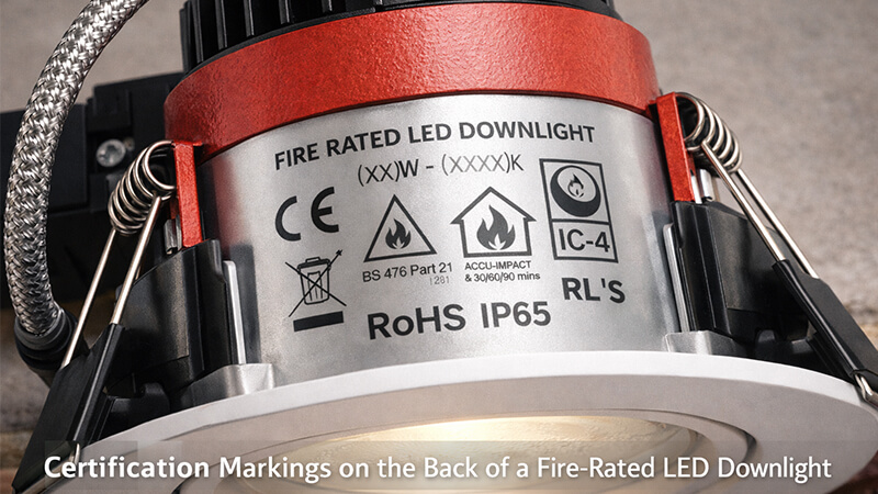 A photo showing the certification markings on the back of a fire-rated LED downlight.